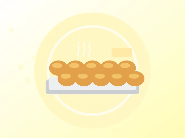 Illustration of a tray of soft golden dinner rolls