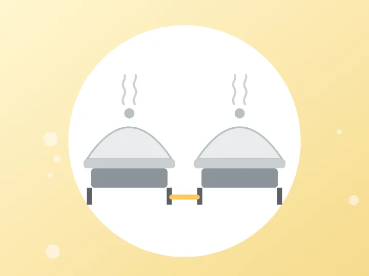 Illustration of two covered chafing dishes used for catering